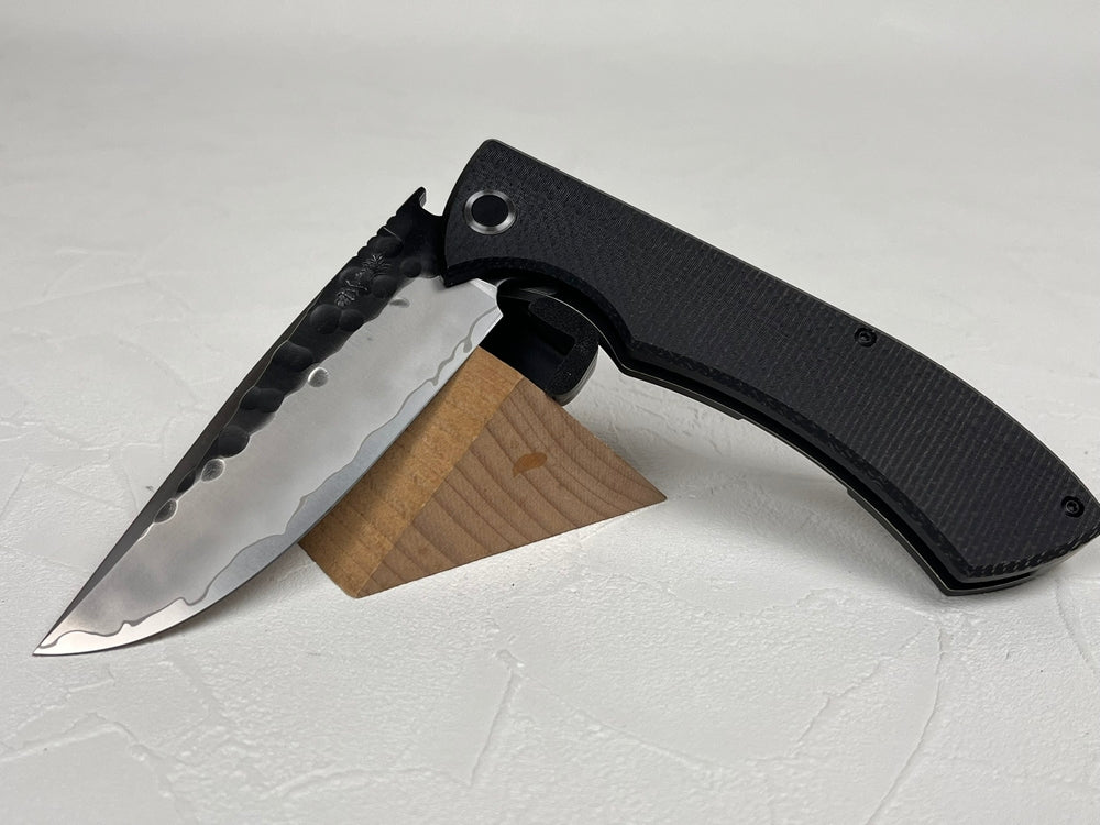 Nigara SG2 kurouchi tsuchime folding knife 96 mm edge length Micarta handle